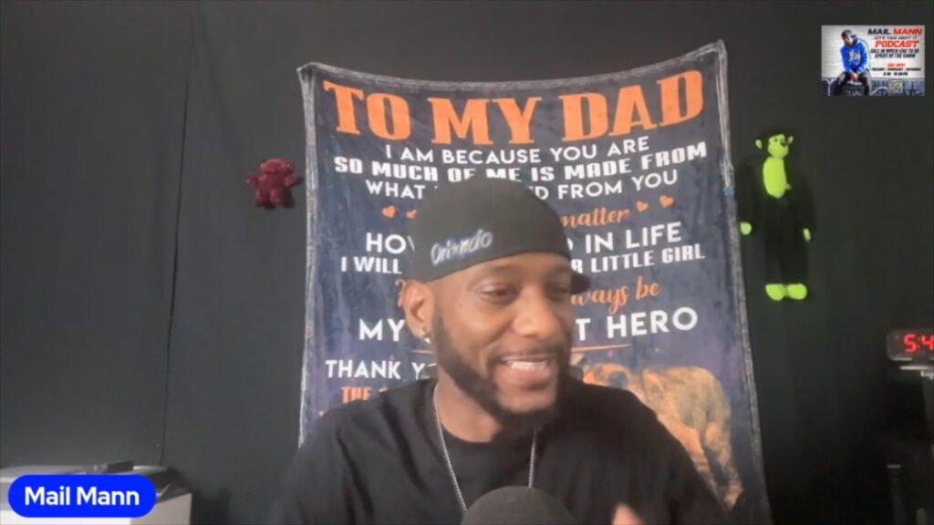 Reginald Jenkins with black screen background